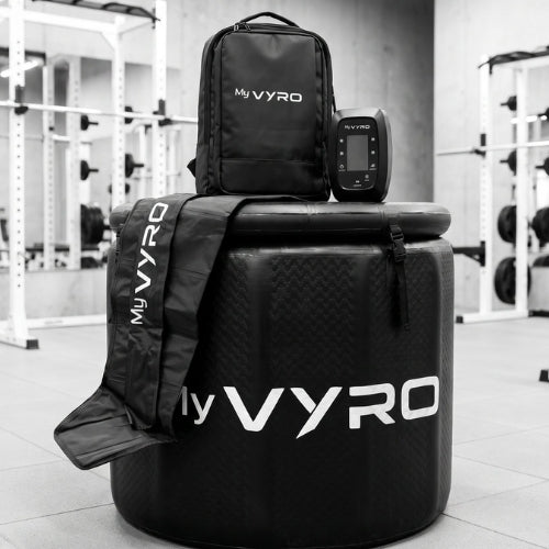 MyVYRO Plunge PRO ice bath with a Pulse PRO compression boot, controller and backpack in a gym