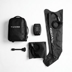 MyVyro compression boots kit laid out on a white background, including a black backpack, electronic controller, boots, and connector cable.